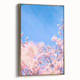 Framed canvas wall art depicting a vintage-style landscape with spring theme in gold and black tones.