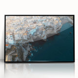Framed acrylic wall art depicting a dramatic cliff landscape, featuring rich colors and intricate details, perfect for adding sophistication to any room decor.
