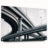 Landscape bridge design displayed in acrylic glass, showcasing intricate details and vibrant colors, mounted with pins for stability and visual appeal.