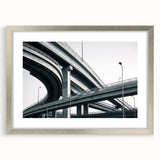 Silver landscape bridge frame with a white mat, showcasing a scenic view. Perfect for enhancing home decor, this elegant frame adds a modern touch to any wall.