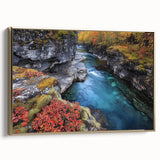 Framed canvas artwork depicting a stunning landscape of canyons in rich earthy tones, accented with a gold frame, perfect for enhancing home decor.