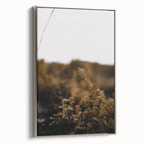 Framed canvas depicting a vintage landscape painting with colorful autumn trees against a black background.
