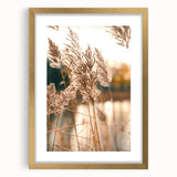 Extra large abstract art print featuring textured swirls in warm orange and yellow tones, framed in gold.