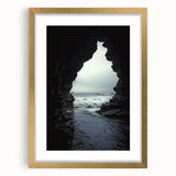 Elegant gold-framed landscape artwork showcasing intricate cave designs, set against a neutral backdrop. Ideal for enhancing home decor with a touch of sophistication.