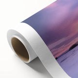 Rolled canvas print showcasing a vibrant landscape barn design, featuring rich colors and intricate details, securely packaged in a protective cardboard tube for easy transport.