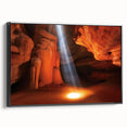 Framed black canvas print showcasing a stunning landscape of canyons, emphasizing rich earth tones and dramatic rock formations, perfect for home decor.