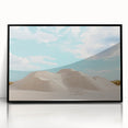 Framed acrylic artwork depicting a vibrant desert landscape, showcasing warm hues of orange and yellow with a sleek black frame, ideal for modern home decor.