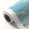 Desert landscape rolled canvas art showcasing vibrant orange and yellow hues, depicting a serene sunset over sand dunes, elegantly packaged in a protective tube.
