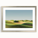 Silver-framed landscape artwork showcasing vibrant green fields under a clear blue sky, elegantly matted for a polished presentation, ideal for home decor.