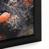 Close-up of textured black wall art featuring colorful abstract elements on a large framed canvas.