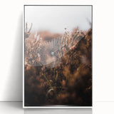 Art deco poster featuring an autumnal scene with warm orange and brown tones on a white framed acrylic.
