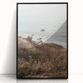 Large abstract wall art featuring swirling blue and white patterns on a black acrylic frame.