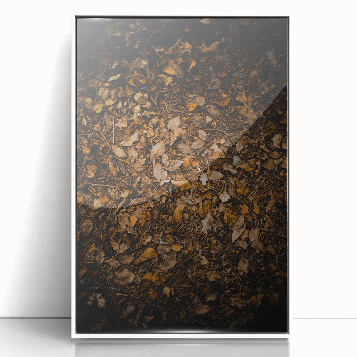 Art deco poster featuring a fall landscape with muted orange and brown tones on a white acrylic framed panel.