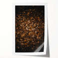 Rolled canvas print featuring an autumnal floral design in warm orange and red tones.