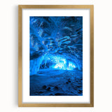 Framed landscape artwork depicting a serene cave scene with a gold mat, perfect for enhancing home decor. The elegant design adds a touch of sophistication to any room.