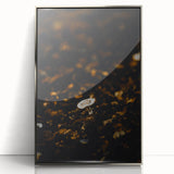 Mid-century modernist art depicting autumn trees in orange and brown on a silver-framed acrylic print.