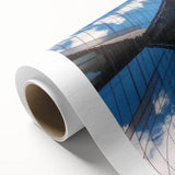 Landscape bridge rolled canvas artwork showcasing vibrant colors and intricate details of a scenic nature view, elegantly packaged in a protective cardboard tube.