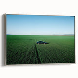 Framed canvas artwork showcasing a serene countryside landscape with vibrant colors, highlighted by a silver frame, ideal for home decor and art enthusiasts.