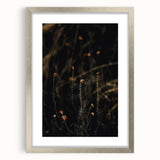 Textured abstract art print in orange and brown tones on a silver-framed canvas, ideal for bedroom wall decor.