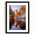 Framed black landscape art print showcasing dramatic cliffs, designed with a sleek mat for an elegant presentation, perfect for modern home decor.