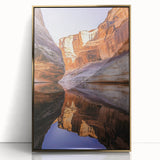 Framed acrylic artwork showcasing a stunning landscape of cliffs against a vibrant sky, featuring gold accents that enhance its elegance, perfect for home décor.