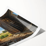 Landscape barn print on rolled canvas showcasing a serene rural scene with vibrant colors and intricate details, designed for home decor enthusiasts.