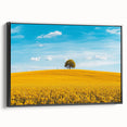 Framed canvas artwork depicting a serene countryside landscape in vibrant colors, showcased in a sleek black frame, perfect for enhancing home decor.