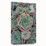 Large abstract floral art in vibrant orange and yellow tones on acrylic glass.