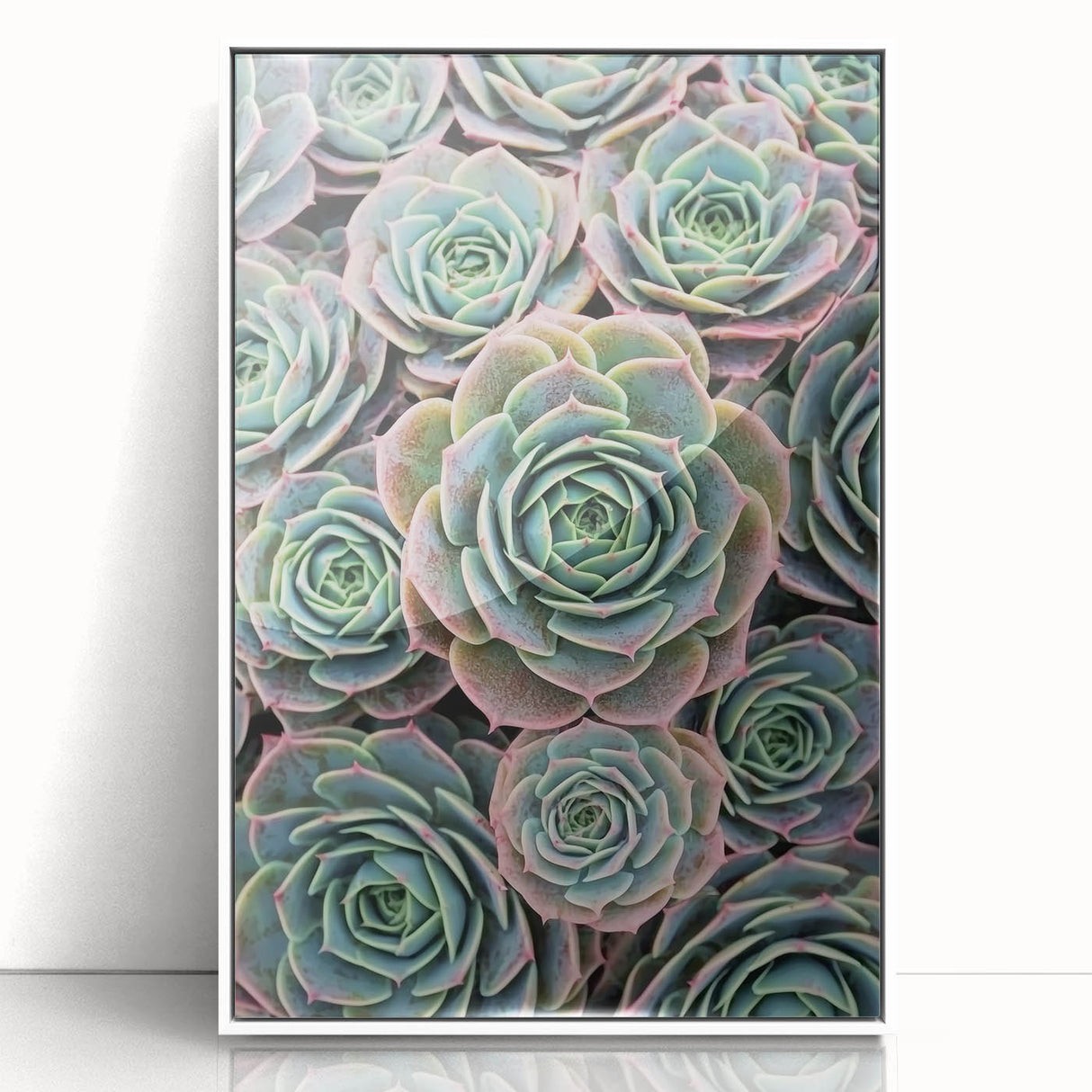 Art deco poster of vibrant florals in pastel shades, framed in white acrylic, ideal for nursery wall art.