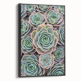 Black and white framed canvas depicting a close-up floral design, ideal for bedroom wall art.