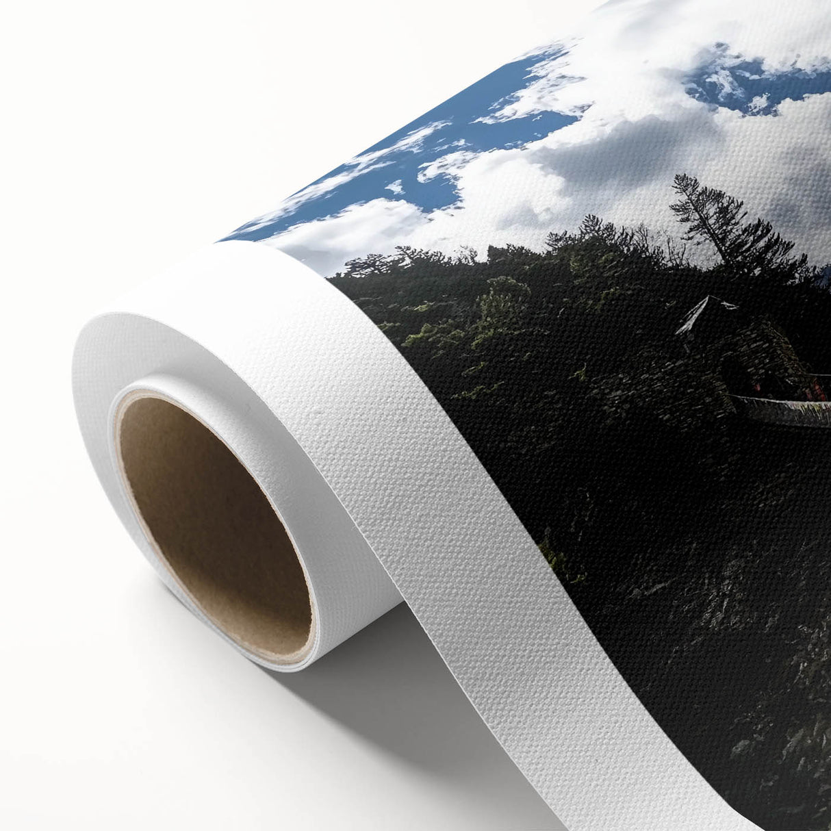 Rolled canvas depicting a vibrant landscape bridge design, showcasing intricate details and rich colors, securely packaged in a protective cardboard tube for safe shipping.