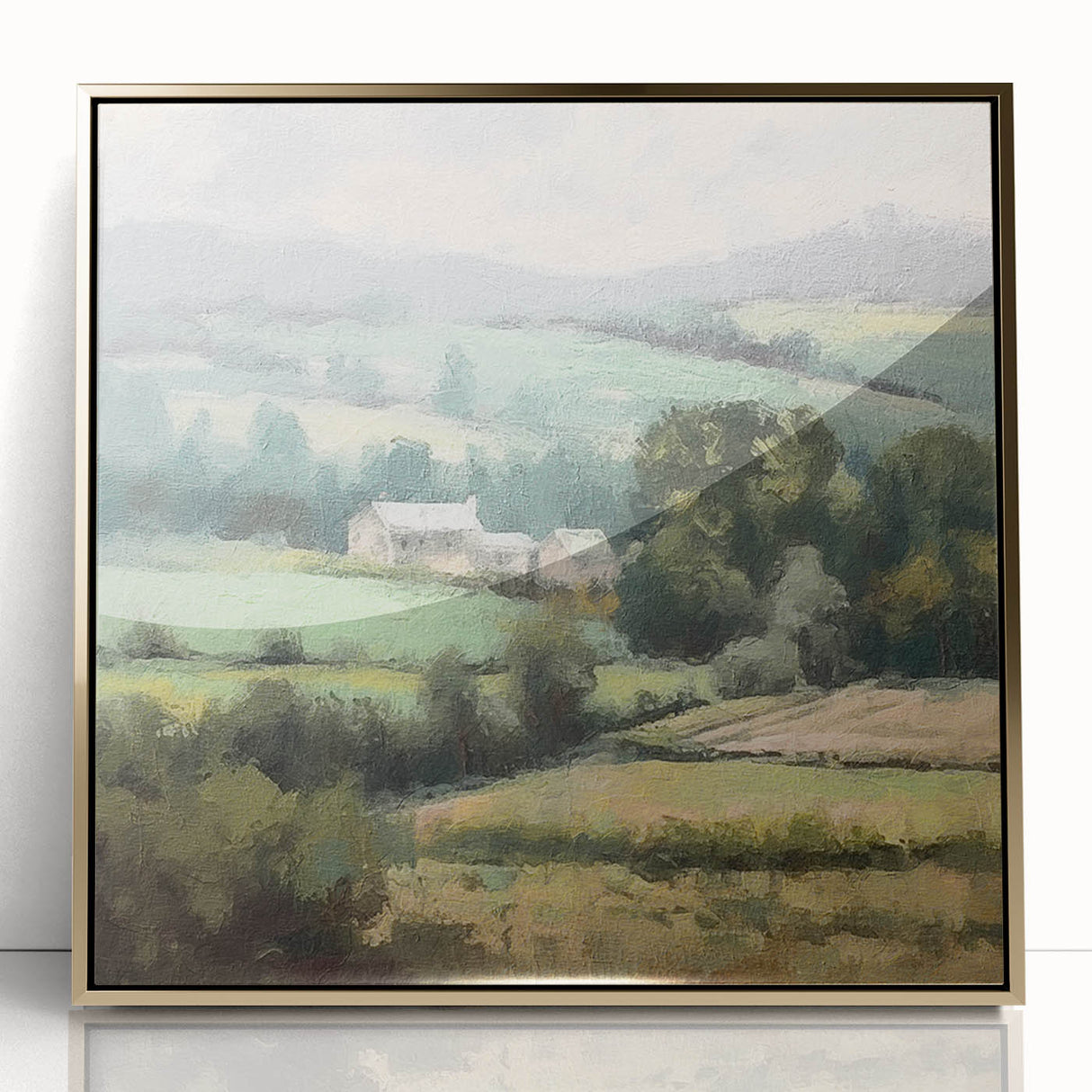 Framed acrylic wall art depicting a serene countryside landscape with rolling hills, lush greenery, and a vibrant sky, accented by a gold frame for elegance.