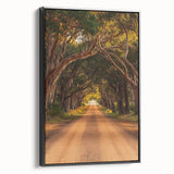 Framed canvas artwork showcasing a serene countryside landscape, featuring vibrant greens and soft blue skies, presented in a sleek black frame, ideal for home decor.