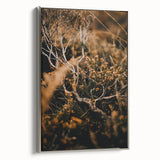 Framed canvas depicting a vintage landscape art painting of a fall scene in muted earth tones, ideal for living room decor.