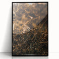 Large abstract wall art depicting autumnal trees in warm orange and red hues, framed in black acrylic.