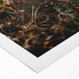 Art deco poster depicting a stylized fall landscape in orange and brown tones on rolled canvas.