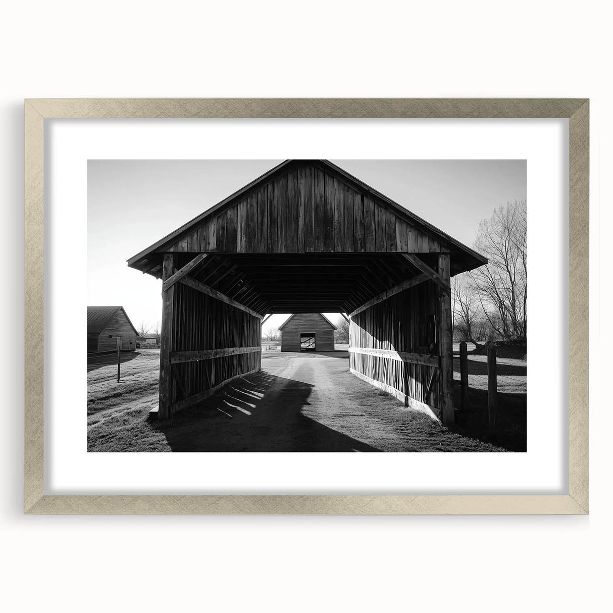Silver-framed landscape barn design with a mat, showcasing a rustic aesthetic. The frame enhances the artwork's charm, perfect for home decor or gallery display.