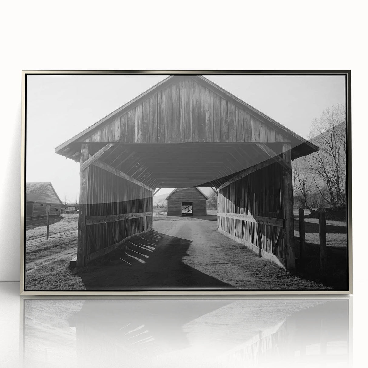 Framed acrylic artwork showcasing a serene landscape scene with a rustic barn, highlighted by silver accents, ideal for home or office decor.