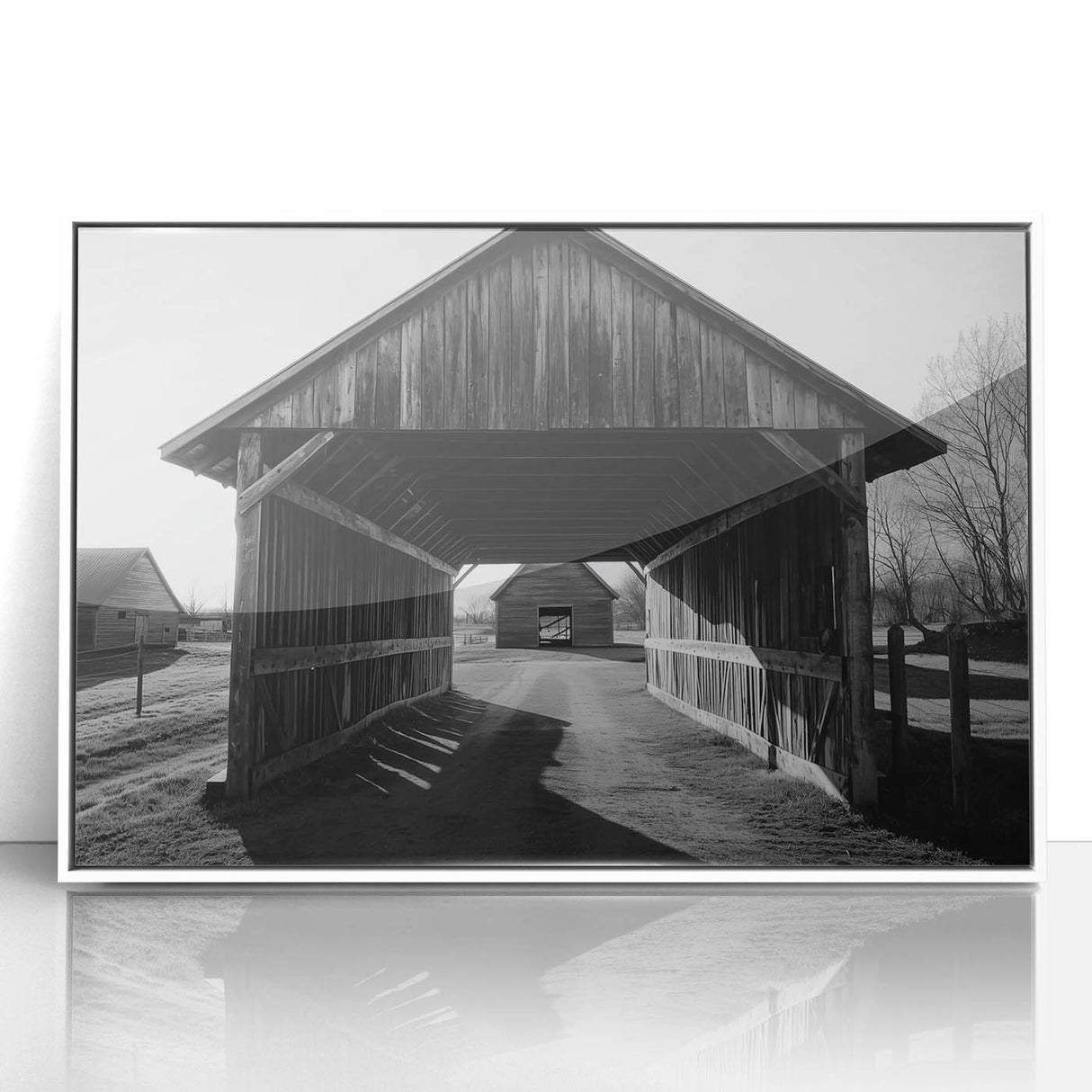 Framed acrylic print of a serene landscape featuring a picturesque barn, surrounded by lush greenery and vibrant flowers, ideal for home decor.