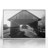 Framed acrylic print of a serene landscape featuring a picturesque barn, surrounded by lush greenery and vibrant flowers, ideal for home decor.
