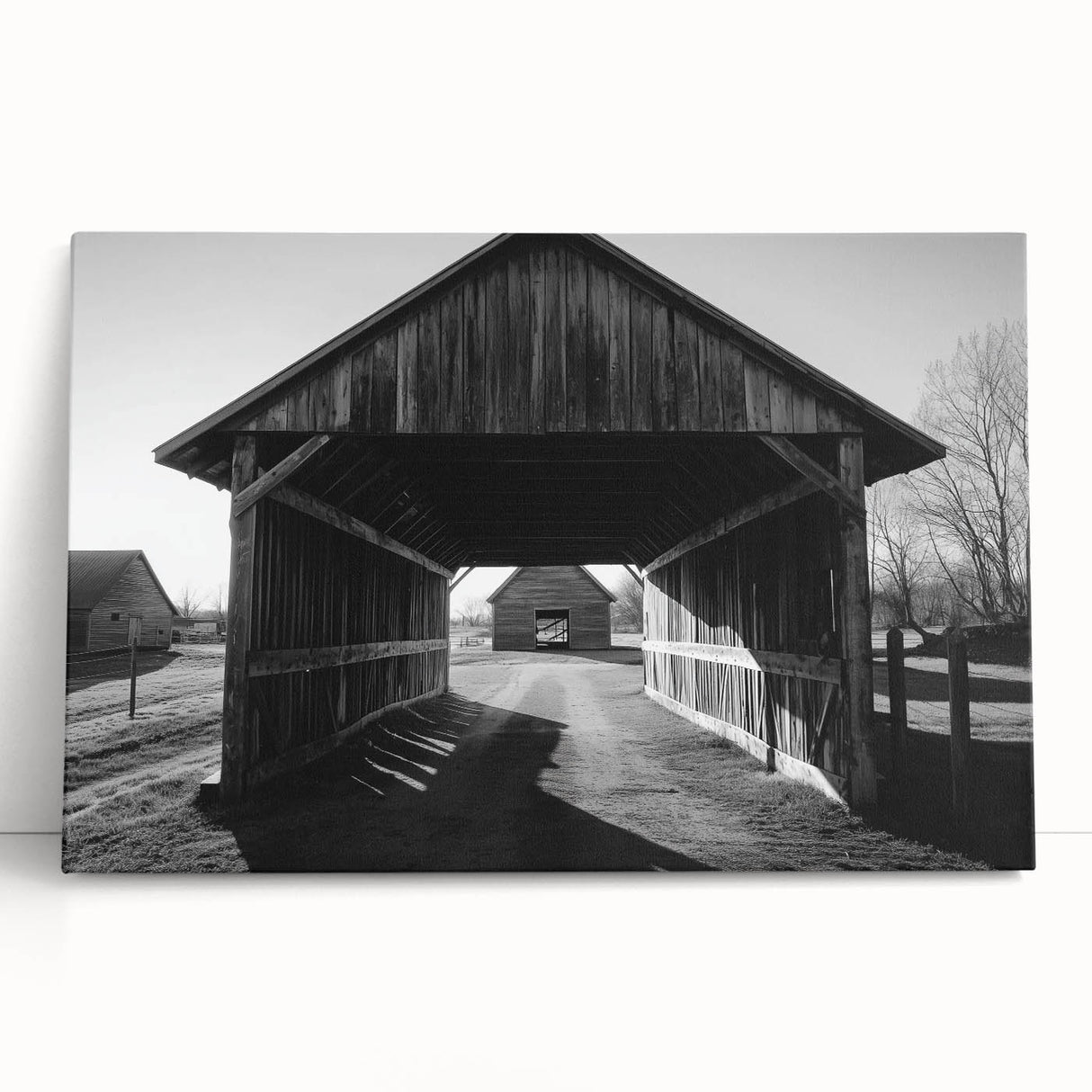 Stretched canvas showcasing a vibrant landscape design with a rustic barn, leaning against a wall, perfect for home decor and farmhouse aesthetics. Ideal for enhancing interior spaces with nature-inspired art.