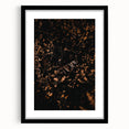 Extra large abstract art print featuring textured fall foliage in vibrant reds and oranges, framed in black.