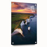 Side view of a vibrant acrylic landscape artwork depicting dramatic cliffs, featuring a glossy finish and secured with decorative pins for display. Perfect for enhancing modern interiors.