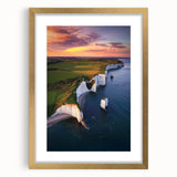 Gold-framed landscape print featuring vibrant cliffs and serene mountains, elegantly matted, perfect for enhancing modern home decor or office interiors.