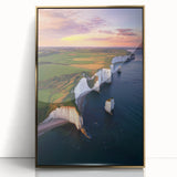 Framed acrylic artwork depicting a stunning landscape of cliffs, showcasing golden hues and intricate details, perfect for enhancing modern home decor.