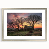 Framed landscape barn artwork in a silver mat, showcasing a rustic scene with warm colors, ideal for enhancing home decor, available from a premium art retailer.