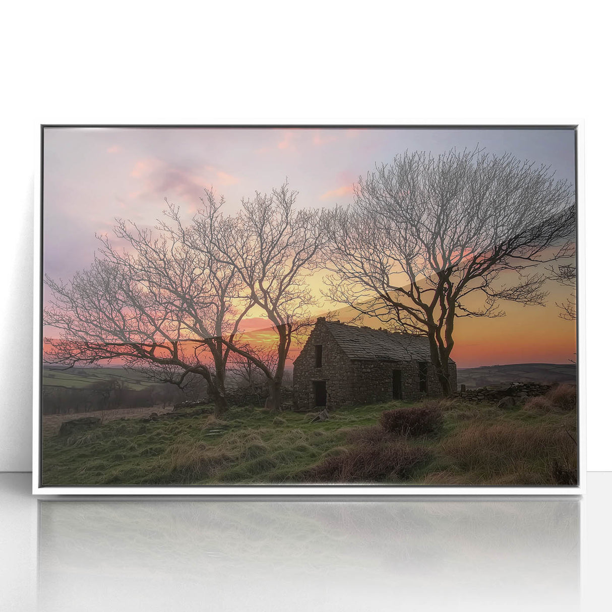 Framed acrylic artwork featuring a serene landscape with a barn, set against a vibrant sky. Ideal for home decor, enhancing rustic and country-themed interiors.