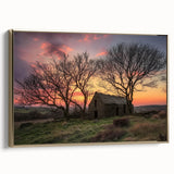 Barn landscape canvas print framed in gold, showcasing a serene rural scene with vibrant colors, ideal for home decor or art collectors. The artwork is elegantly displayed from a side view, highlighting its framing details and texture.