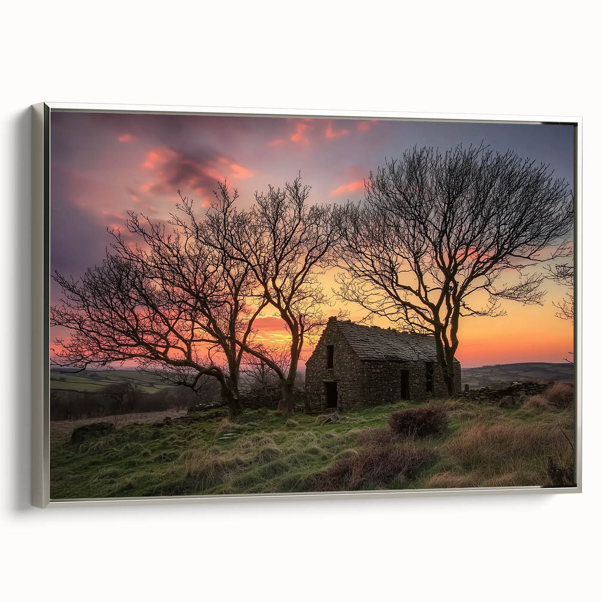 Landscape barn-framed canvas artwork showcasing a serene countryside scene with vibrant colors and intricate details, framed in a sleek silver finish, ideal for home decor.