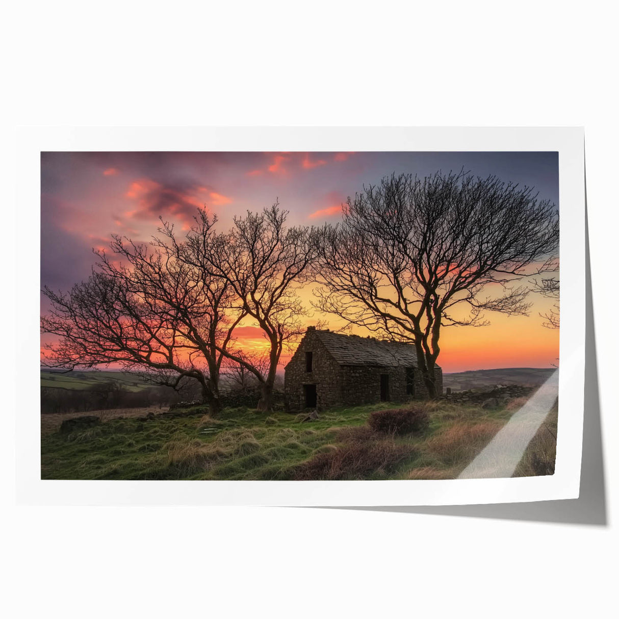 Rolled print showcasing a vibrant landscape scene with a rustic barn, featuring detailed textures, rolled for shipping in a protective cardboard tube. Perfect for home decor enthusiasts.